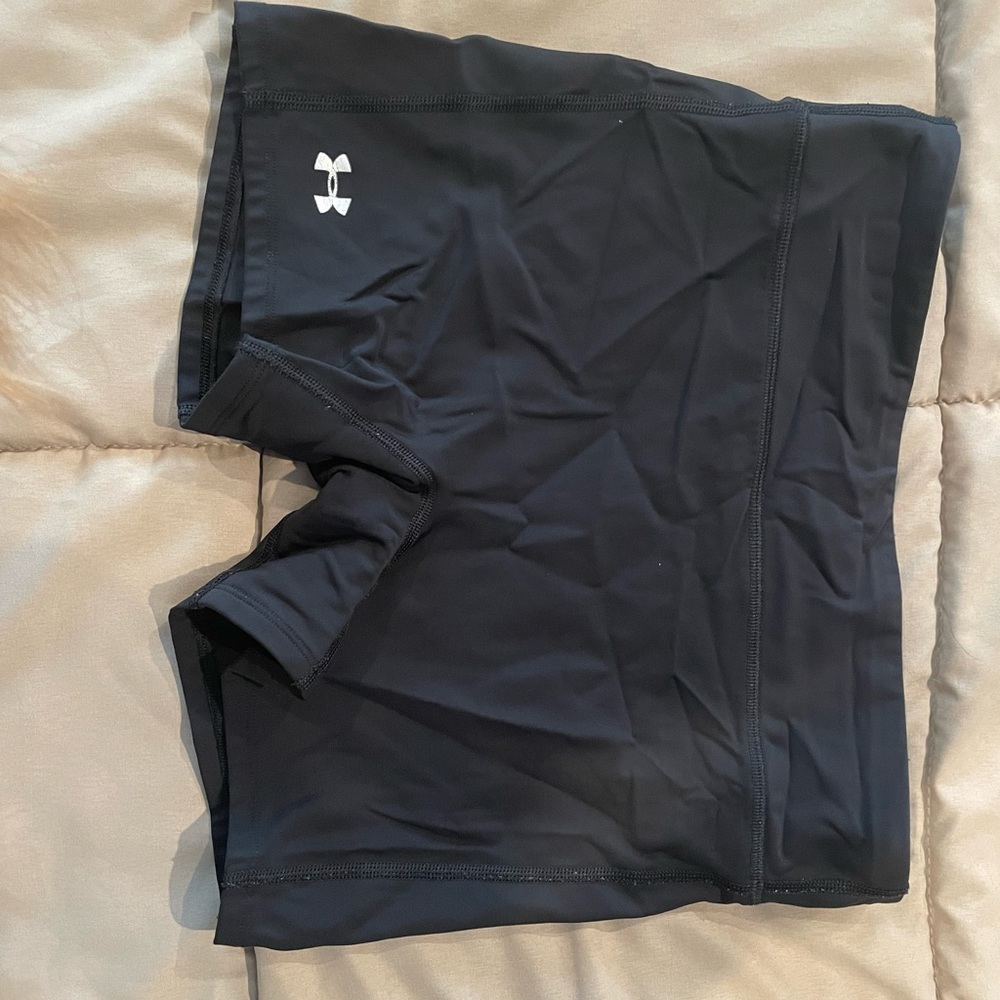 Under Armour compression shorts.